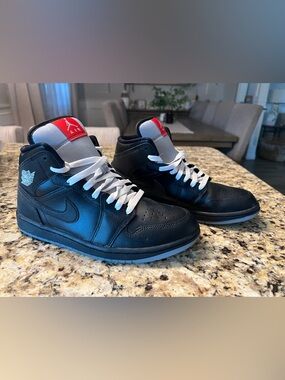 Nike Black/White/Red Air Jordan 1 Mid Sneakers